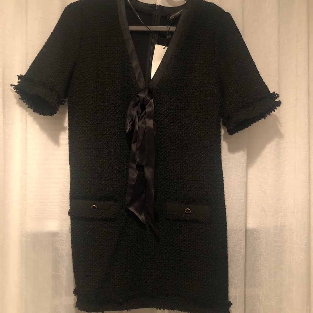 Black Zara dress with details.